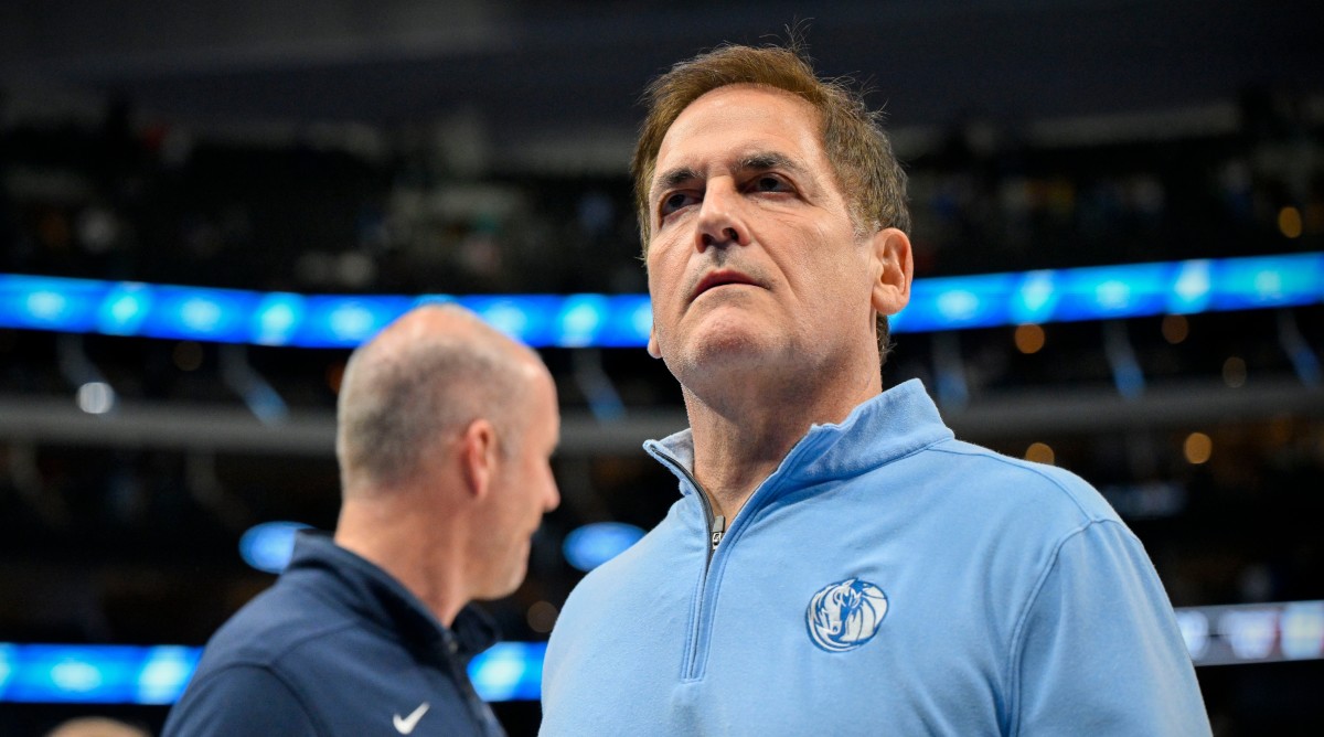 Dallas Mavericks owner Mark Cuban looks on during a basketball game.